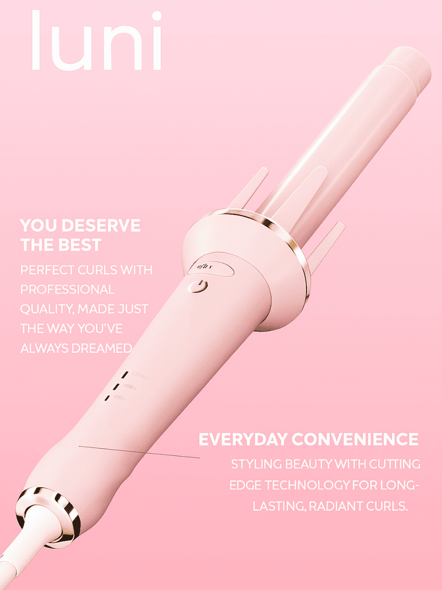 Pink hair curler with 'luni' branding on a pink background